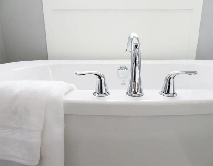 White bathtub with chrome faucet