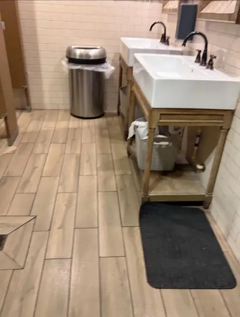 Commercial restroom sinks cleaned by our team